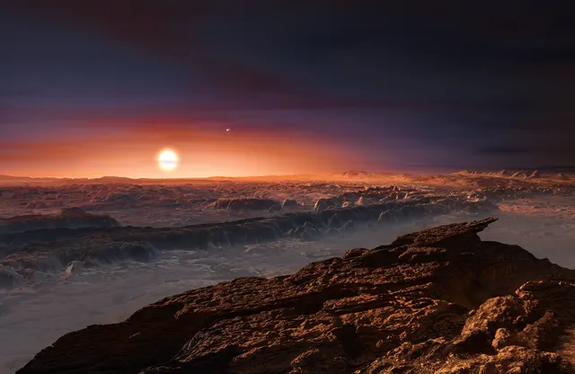ESO illustration of the rocky surface of Proxima b with its red star in the sky; it is not a photo
