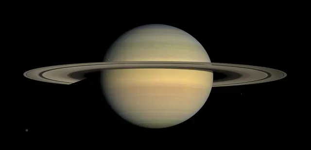 Saturn with its rings seen edge-on, in a mosaic from the Cassini spacecraft